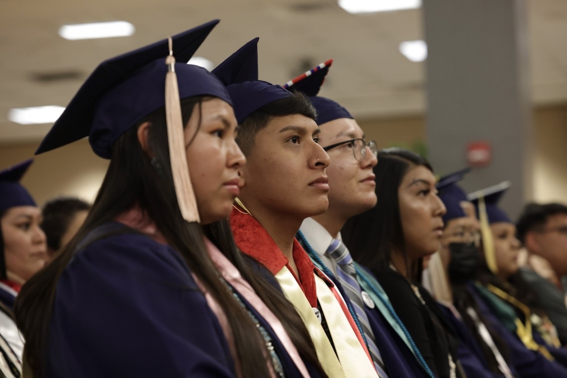 Graduates listen to speakers at the convocation ceremony for Native American students on May 6. (Photo by Chris Richards/University Communications)
