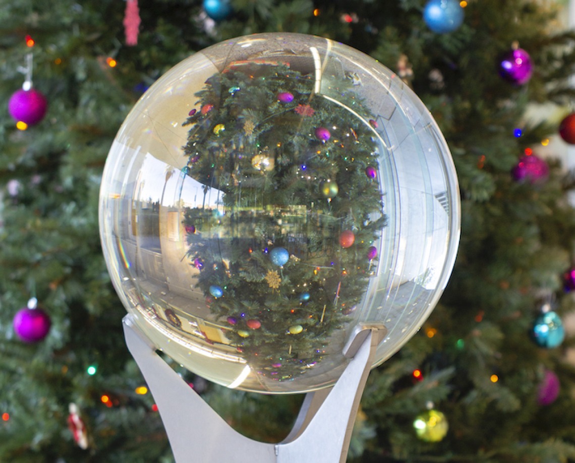 The tree in the lobby of Meinel Optical Sciences, seen through a sphere on display year-round. (Photo by Ameé Hennig, media content manager, James C. Wyant College of Optical Sciences)