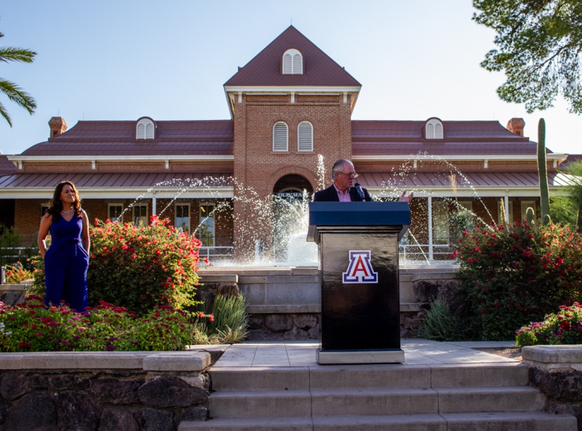 President Robert C. Robbins delivers remarks at the UA Cares campaign kickoff event. Karla Bernal Morales (left), interim director of the Office of Multicultural Advancement, is coordinating the campaign. (Photo: Kyle Mittan/University Communications)