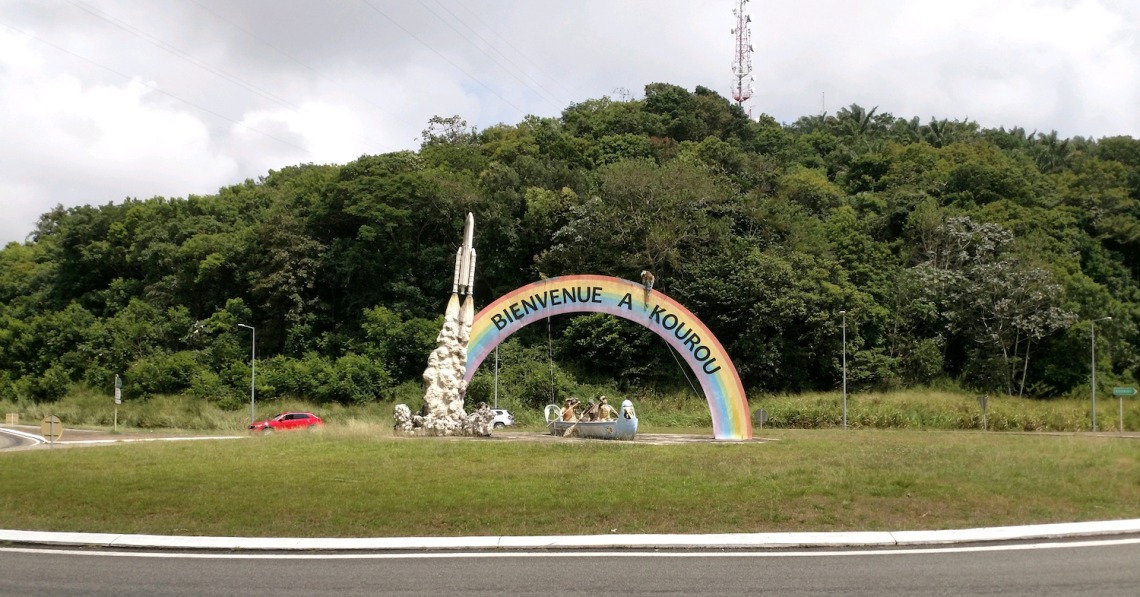 A monument welcomes visitors to the town of Kourou.