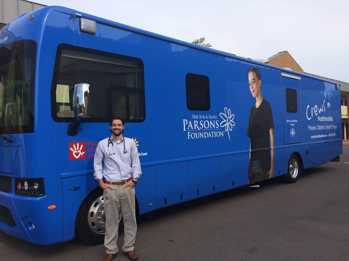 Gary Kirkilas stands in front of the mobile health unit he uses to reach homeless and disadvantaged communities.